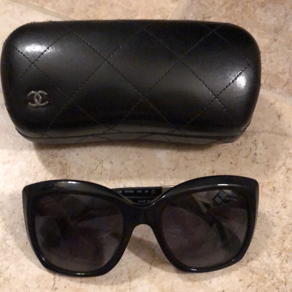 Chanel Polarized sunglasses with leather case.